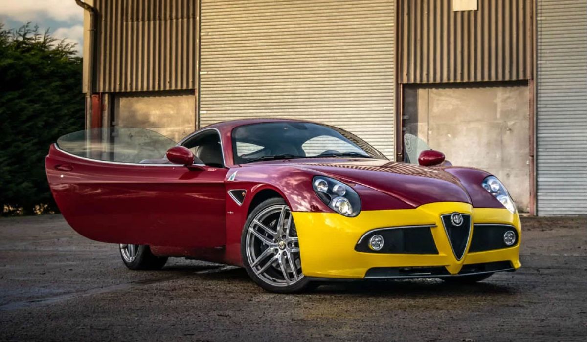  Aston Martin DB11 V8 race car in sleek design, showcasing its aerodynamic features and vibrant racing colors.  