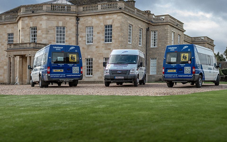 a bus wrapped in blue and white