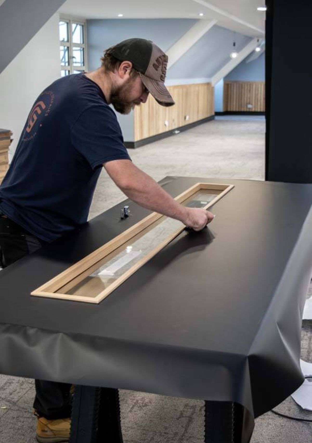 a man wrapping a door